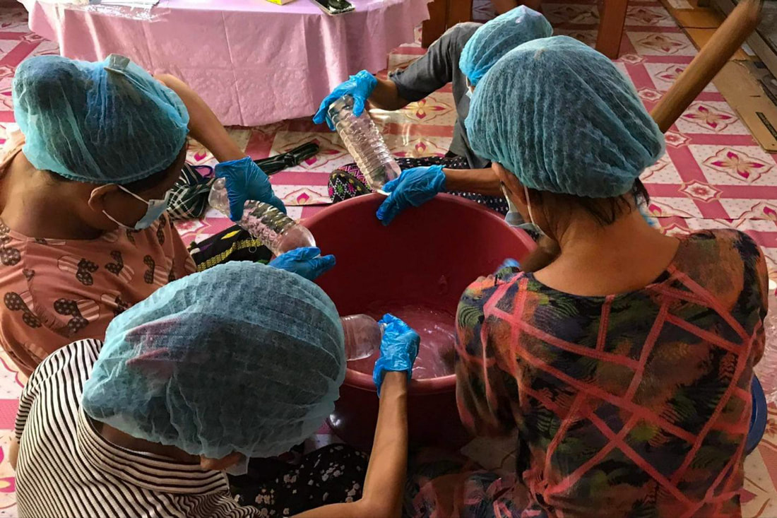 PictureWomen at a TWG safe house in southeast Myanmar make hand sanitizer as part of occupational therapy and to earn income.