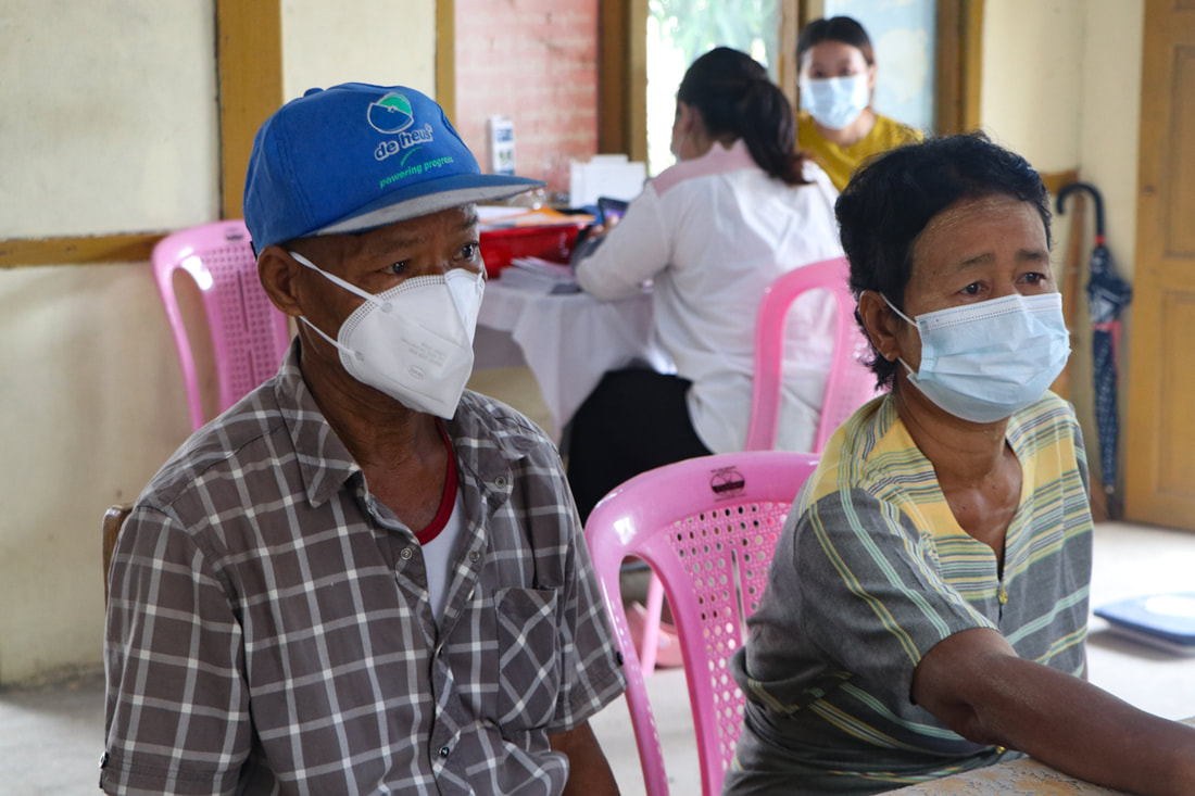 U San Hla (left) and his wife attend a appointment at the YMCA's Yay Sin clinic in Nay Pyi Taw, Myanmar.
