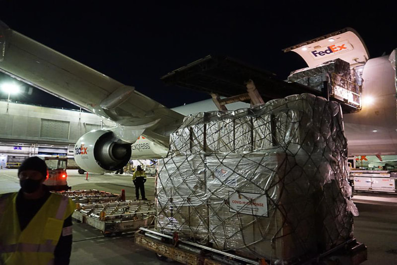 A shipment of oxygen concentrators and N95 masks is loaded at Newark Airport on May 8, 2021.