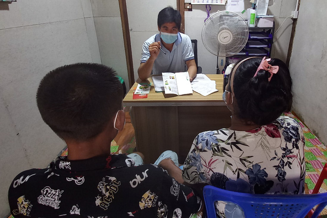 A counseling session underway at a clinic in Kachin State, Myanmar, operated by the Asian Harm Reduction Network with support from USAID’s HIV/TB Agency, Information and Services Activity.