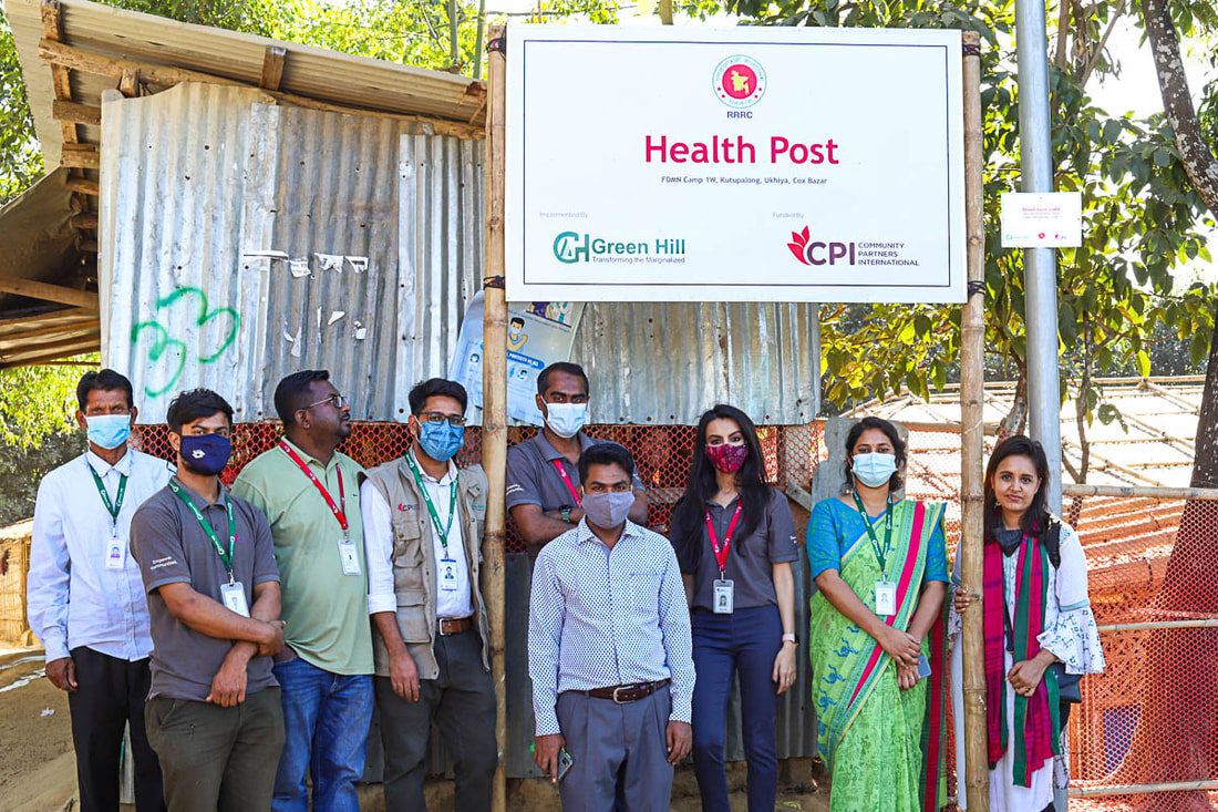 Staff members from CPI and Green Hill at the new health post in Camp 1W of Kutupalong Refugee Camp, Cox's Bazar, Bangladesh.