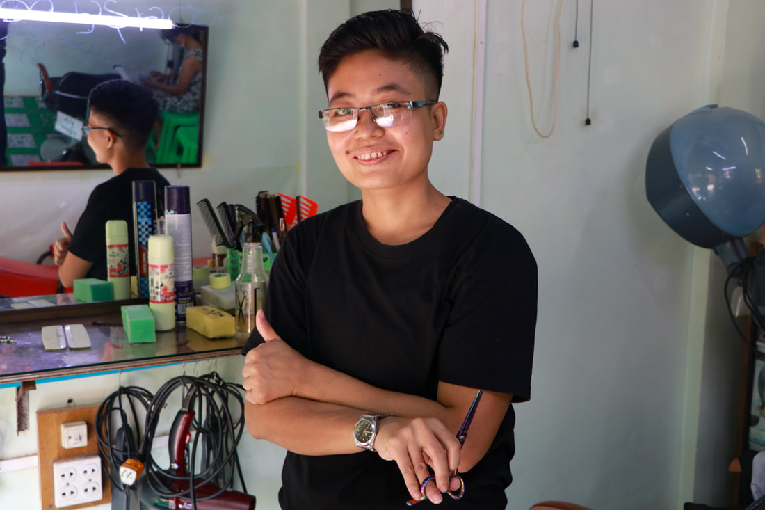 Ko Moe at his hair salon in Insein Township, Yangon, Myanmar.